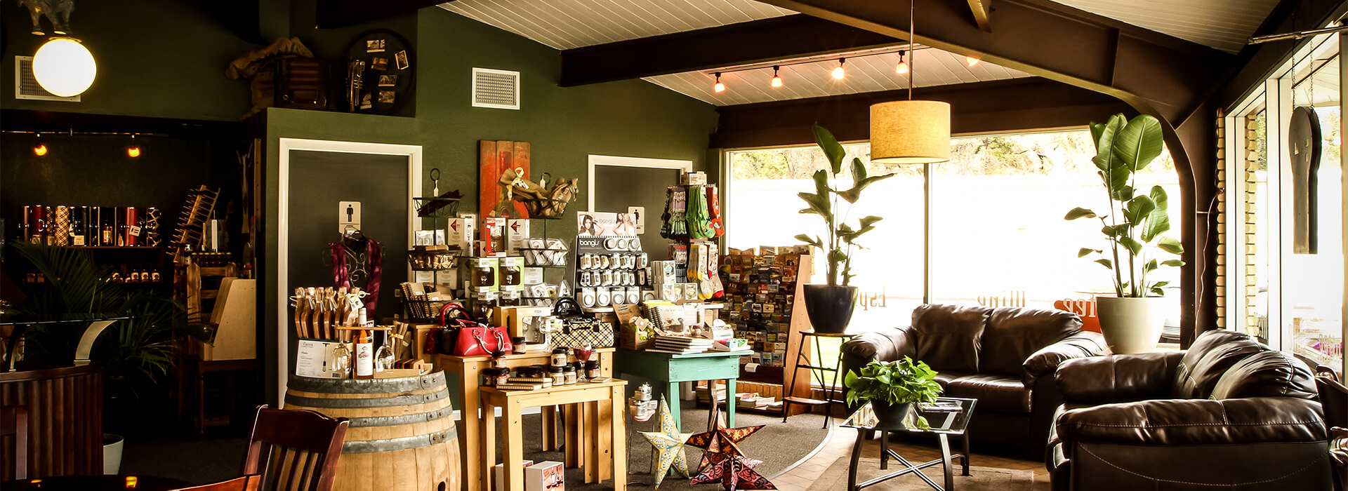 An interior photo of Grapes and Grinds where you can choose from an assortment of local wines.