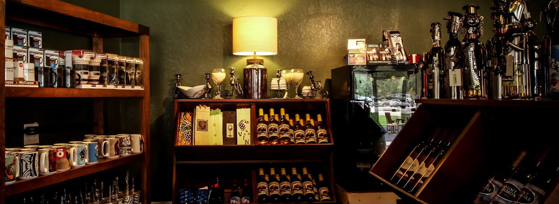 An interior photo of Grapes and Grinds where you can choose from an assortment of local wines.